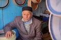 Portrait of a local craftsman. He is wearing a chechia traditional hat