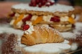 Sfogliatella, typical Neapolitan pastry, with yellow cream and strawberry, Naples, Italy Royalty Free Stock Photo