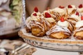 Sfogliatella, typical Neapolitan pastry, with yellow cream and strawberry Royalty Free Stock Photo
