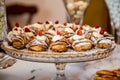 Sfogliatella, typical Neapolitan pastry, with yellow cream and strawberry Royalty Free Stock Photo