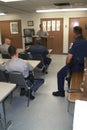 Police sargeant holds roll call for fellow police officers