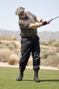 Sgt. Slaughter golfing in tournament Royalty Free Stock Photo