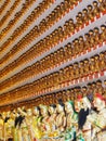 Numerous Buddha statues, incorporated in the walls of the Ten Thousand Buddhas Monastery Royalty Free Stock Photo