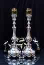 Shabbat candles. Silver candlesticks with olive oil