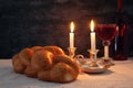 shabbat image. challah bread, shabbat wine and candles