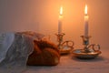 shabbat image. challah bread, shabbat wine and candles