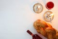 shabbat image. challah bread, shabbat wine and candles