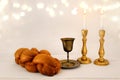 shabbat image. challah bread, shabbat wine and candles on the table Royalty Free Stock Photo