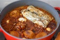 Shabbat or Sabbath traditional food on the hot plate in the kitchen.