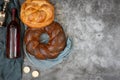 Shabbat Shalom - challah bread, shabbat wine and candles on grey background. Top view. With copy space Royalty Free Stock Photo