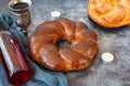 Shabbat Shalom - challah bread, shabbat wine and candles on grey background. With copy space Royalty Free Stock Photo