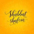 Shabbat shalom greeting card lettering - black text on bright yellow-orange background with rays of light Royalty Free Stock Photo