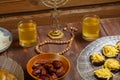 Shabbat table with traditional holiday food menorah