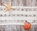 Shabby chic background with seashells and lace on the old wood Royalty Free Stock Photo