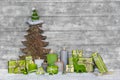 Shabby chic green and white christmas decoration on grey wooden Royalty Free Stock Photo