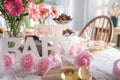 Shabby Chic pink baby shower decorations on table Royalty Free Stock Photo