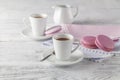 Shabby chic style coffee cup and plate with macaroon cookie