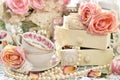 Shabby chic style decorations with tea cups, roses and laces Royalty Free Stock Photo
