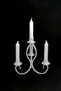 Shabby chic white candelabra on black