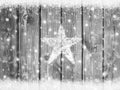 Christmas snow background with star on wooden board Royalty Free Stock Photo