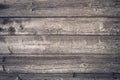 Shabby dark wood texture. Vintage wooden fence, desk surface. Natural color. Weathered timber, background. Gray old wood planks. Royalty Free Stock Photo