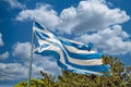 Shabby greek flag waving in the wind Royalty Free Stock Photo