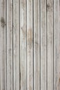 Shabby light white wooden vertical texture macro