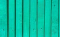 Shabby Narrow Plank Wood Fence Background. Pastel Turquoise Aquamarine Color. Surface Texture with Details Nails Holes. Rustic Royalty Free Stock Photo