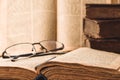 Shabby pages of worn old jewish books in leather binding. Reading Torah. Closeup. Selective focus