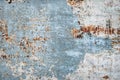 Shabby rusty surface. Peeling blue paint. Vintage background