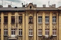 Shabby wall with rooftop of old vintage building, european architecture, residense or appartment