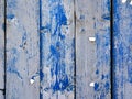 Shabby wooden planks with cracked blue colored old paint Royalty Free Stock Photo