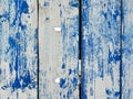 Shabby wooden planks with cracked blue colored old paint Royalty Free Stock Photo