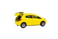 Shabby yellow car model toy isolated on white background. Royalty Free Stock Photo