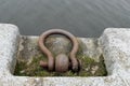 Shackles for ship attachment on the shore, pier Royalty Free Stock Photo