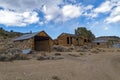 Shacks line the gravel street of an abandoned mercury mine in Nevada, USA