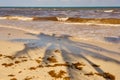 The shade of a palm tree on a tropical beach in the Caribbean Sea in Mexico. Royalty Free Stock Photo