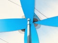 Shade sails in white in front of a blue sky.