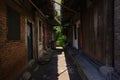 Shaded alley between ancient houses in sunny summer,China