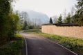 Shaded country road in sunny winter afternoon