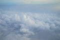 Shades of light blue color sky and amazing white floating cloud view from airplane window Royalty Free Stock Photo