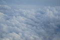 Shades of light blue color sky and floating white cloud wonderland view from airplane window Royalty Free Stock Photo