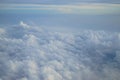 Shades of light blue color sky and floating white cloudscape heaven view from airplane window Royalty Free Stock Photo