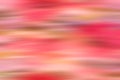 Shades of Pink, coral and yellow in an abstract motion effect blurred background. Royalty Free Stock Photo