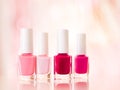 Shades of pink and red nail polish set on glamour background, nailpolish bottles for manicure and pedicure, luxury