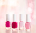 Shades of pink and red nail polish set on glamour background, nailpolish bottles for manicure and pedicure, luxury