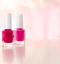 Shades of pink and red nail polish set on glamour background, nailpolish bottles for manicure and pedicure, luxury