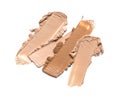 Close-up of make-up swatches. Smears of beige skincare beauty product concealer or foundation