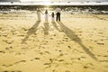 Shadow on beach of family look to sea in wedding day.foot print Royalty Free Stock Photo