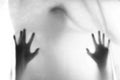 Shadow blur of horror man.Hands on the white cloth. Halloween background.Black and white picture. Royalty Free Stock Photo